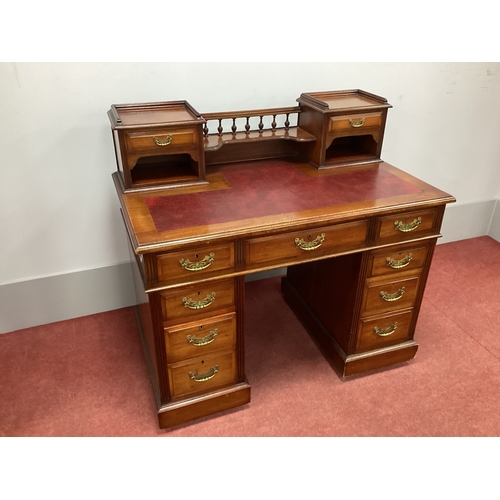 1500 - An Early XX Century Mahogany Pedestal Desk, the upper section with centre rail, turned spindles, sha... 