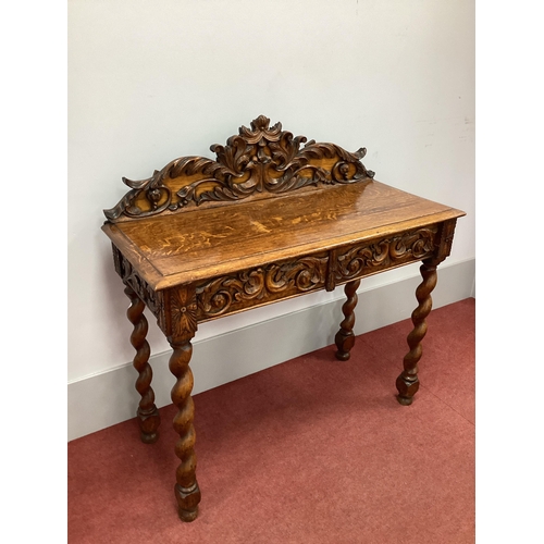 1505 - A XIX Century Carved Oak Side Table, with foliate and scroll carving to back, top with moulded edge ... 