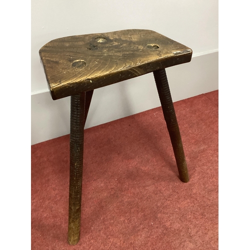 1510 - A XIX Century Elm Three Legged Cutler's Stool, 51cm high.