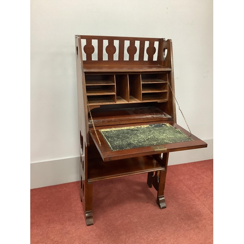 1532 - An Arts & Crafts Mahogany Writing Desk, the three-quarter gallery with heart shaped decoration, fall... 