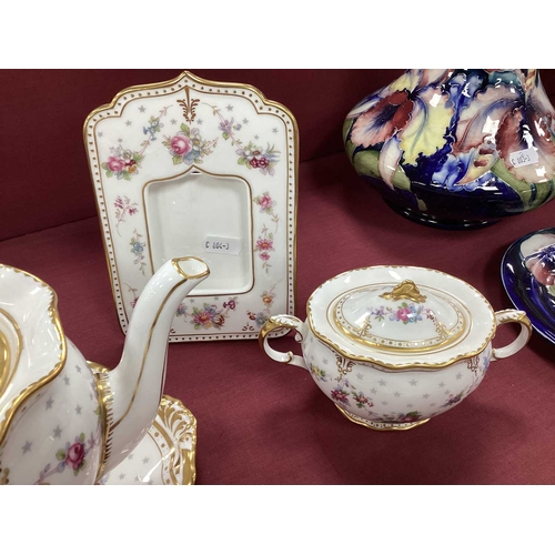 1063 - A Collection of Royal Crown Derby Porcelain in the 'Royal Antoinette' Pattern, various dates, printe... 