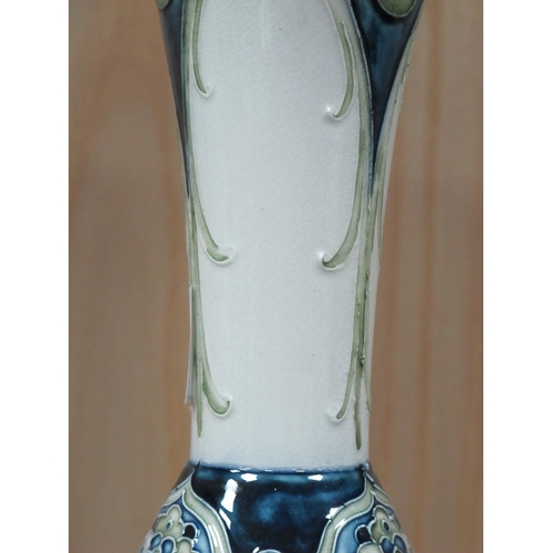 1091 - A Moorcroft for James Macintyre and Co Ltd Pottery Vase, of baluster form with tapered neck, painted... 