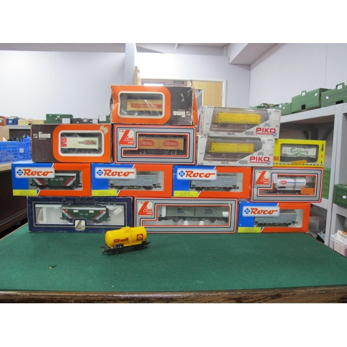 199 - Fourteen HO Gauge European Outline Wagons by Roco, Lima and other, mainly boxed.