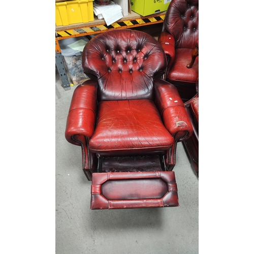 1468 - Red Leather Three Piece Suite, with button backs, stud decoration, plus footstool. (4).