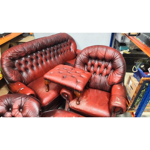 1468 - Red Leather Three Piece Suite, with button backs, stud decoration, plus footstool. (4).