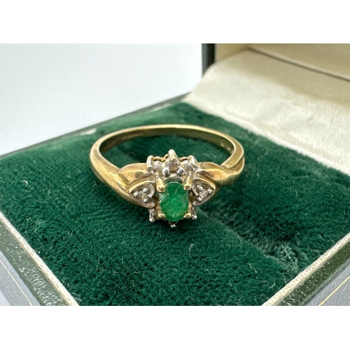 129 - A 9ct Gold Diamond and Stone Set Cluster Ring, of flowerhead design, the oval centre stone four claw... 