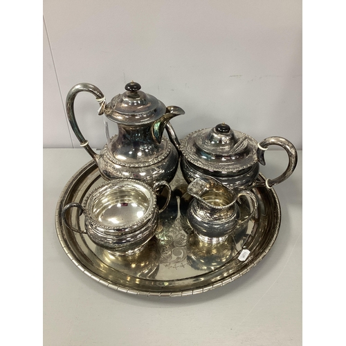 221 - An EPNS Four Piece Teaset, makers mark GWS, of sinuous design with bead and reel rim, scrolling loop... 