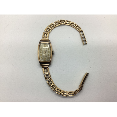 279 - A Vintage 9ct Gold Cased Ladies Wristwatch, the unsigned dial with gilted Arabic numerals, within cu... 