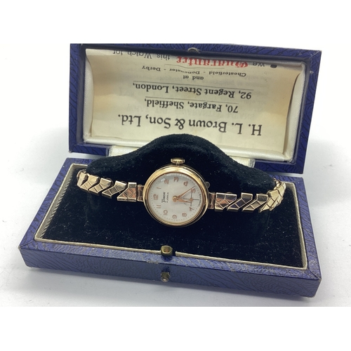 287 - Timor; A 9ct Gold Cased Ladies Wristwatch, the circular signed dial with Arabic numerals and seconds... 