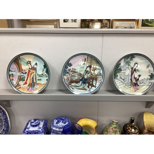 1138 - Imperial Jingdezhen pottery plates 'Beauties of the Red Mansion' (x12) together with display rack.