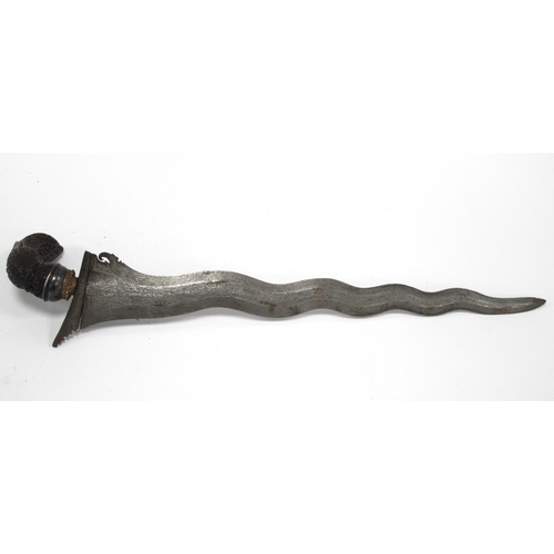 1338 - Kris - Indonesian/Malayan, with silvered blade, ornately carved wooden handle, 47cm long in tomahawk... 