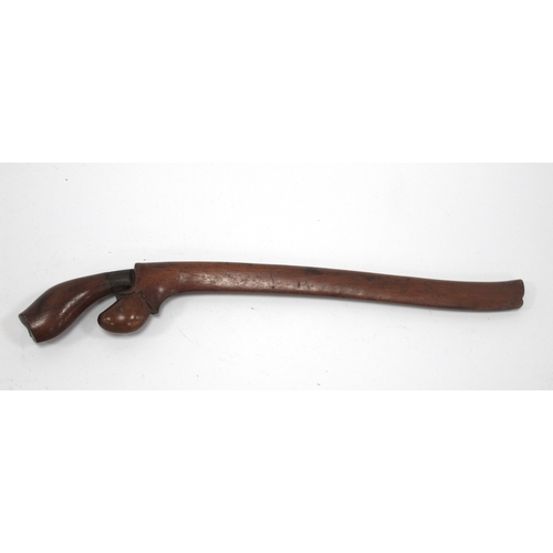 1338 - Kris - Indonesian/Malayan, with silvered blade, ornately carved wooden handle, 47cm long in tomahawk... 