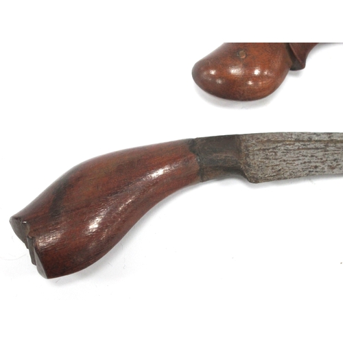 1338 - Kris - Indonesian/Malayan, with silvered blade, ornately carved wooden handle, 47cm long in tomahawk... 