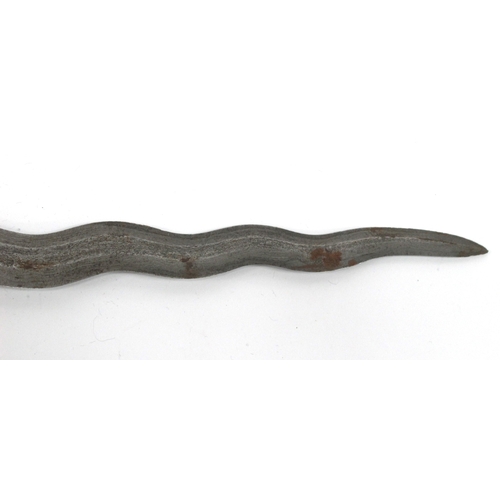 1338 - Kris - Indonesian/Malayan, with silvered blade, ornately carved wooden handle, 47cm long in tomahawk... 