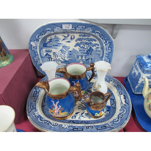 1147 - XIX Century Blue & White Pottery Willow Pattern Meat Plates (x 3), three copper lustre jugs, a pair ... 