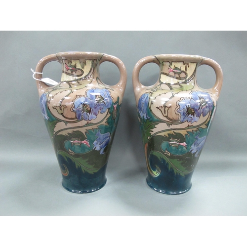 1152 - Zuid Holland, Pair of pottery vases probably Gouda, each featuring bluebells and foliage with deep b... 