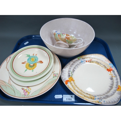 1192 - Six Clarice Cliff Pottery Plates, various patterns, a cream pottery bowl and a sauce boat and stand,... 