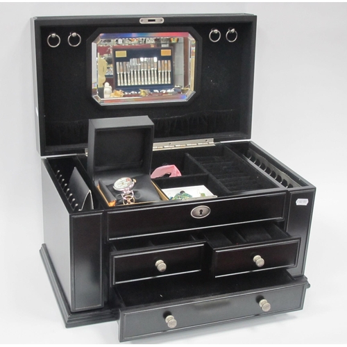 1268 - Ladies black ebonised jewellery box with a hinged lid and sides, fitted interior, three drawers, tog... 