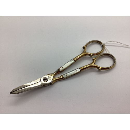 17 - A Pair of Vintage Gilted Ed Wusthof Mother of Pearl Handled Grape Scissors, scrolling decorative rin... 