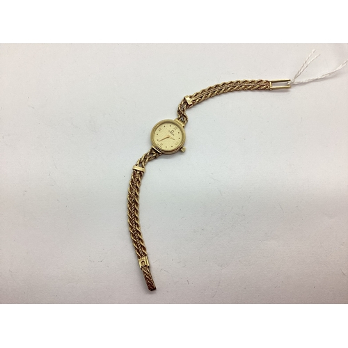 215 - Omega; A Vintage 9ct Gold Cased Ladies Wristwatch, the signed textured dial with Roman numeral quart... 