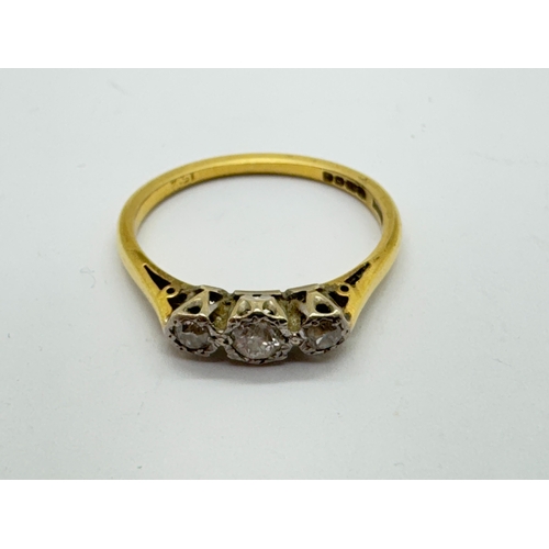 30 - An 18ct Gold Three Stone Diamond Ring, the brilliant cut stones circular collet set within illusion ... 