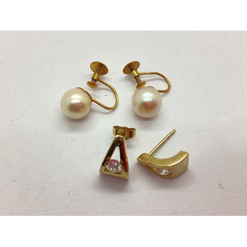 54 - A Pair of Freshwater Pearl Bead Clip On Earrings, the pearls to screw backs stamped 