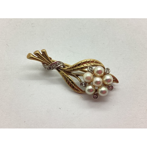 57 - A 9ct Gold Freshwater Pearl Bead and Diamond Set Floral Spray Brooch, the pearl beads of blush hue, ... 