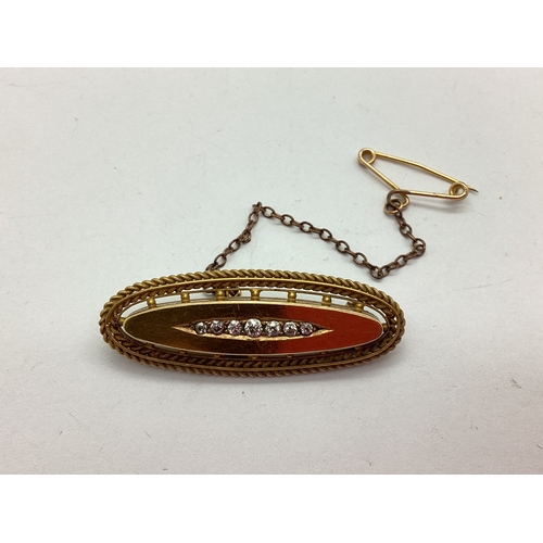 59 - A Victorian Diamond Set Mourning Brooch, the graduated old cut stones inset, within boat shape setti... 