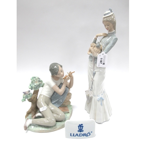 1187 - Lladro 'Walk the Dog' Figure 4893, 35cm tall (boxed); Together with Student Bluts Player (damaged) p... 