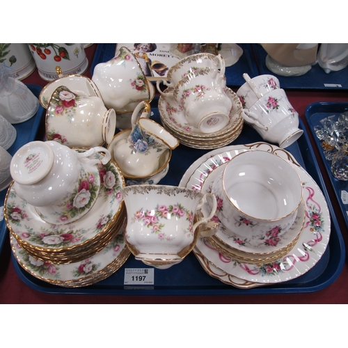 1197 - Royal Albert 'Celebration' 'Dimity Rose', 'Cottage Roses' and 'Moon Rose' table china, thirty-six pi... 