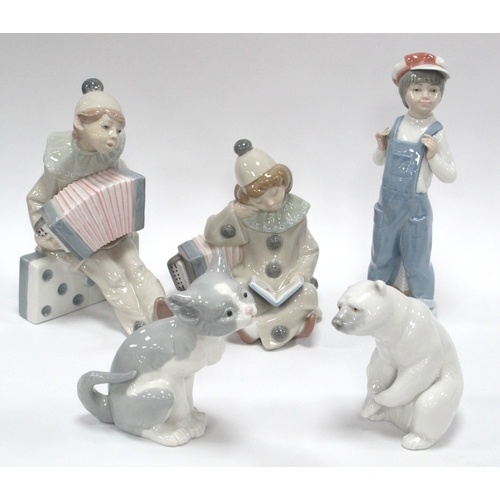 1205 - Lladro figruines to include two clowns with accordions, one boy with accordions, polar bear and cat,... 