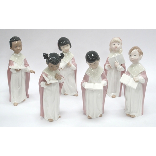 1223 - Golden Memories from Lladro a collection of six choir singers each holding music book, 22.5cm high. ... 