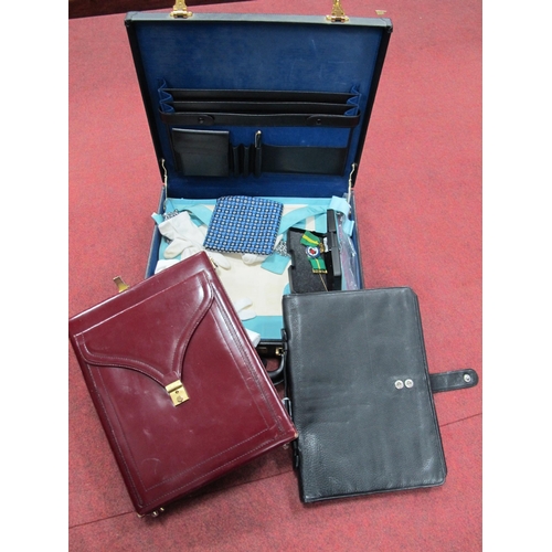 1410 - A Black Leather Case containing masonic regalia etc; A Burgundy Leather Case and a Penhaligon's Leat... 