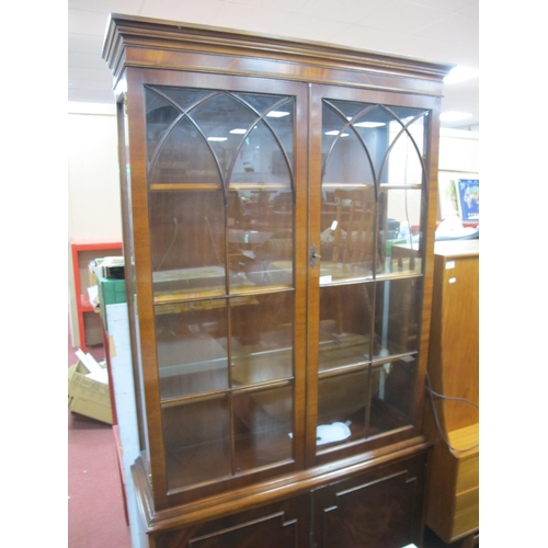 1525 - Mahogany Display Cabinet with stepped pediment, over arch astragal glass doors, panelled doors and b... 