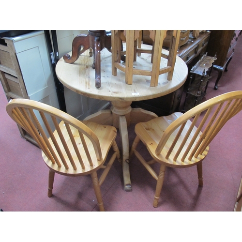 1535 - Pine Pedestal Table, with a circular top, on cabriole legs, together with two pine chairs (3).