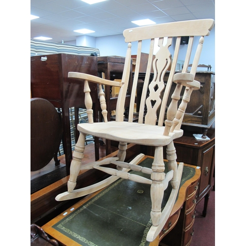 1548 - XIX Century Style Beechwood Rocking Chair with Pierced Back, shaped arms, on rockers, approximately ... 