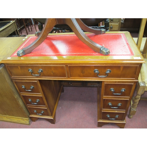 1557 - XX Century Yew Wood Pedestal Desk, with a crossbanded top red leather sciver, three top drawers, fla... 