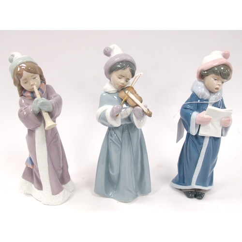 1256 - Lladro figurines to include Spirit of Christmas, Christmas Caroler and Christmas Song, tallest 25cm ... 