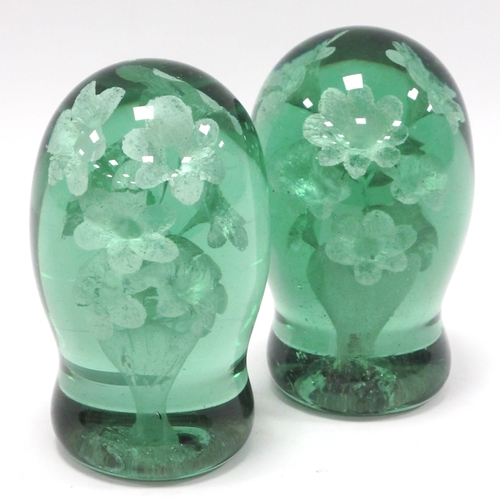 1213 - A Pair of Late XIX Century Green Glass Dump Paperweights, with flowerhead inclusions, 16cm high. (2)... 