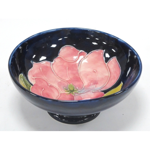 1217 - Moorcroft Pottery 'Magnolia' Design Bowl, on blue ground, 14cm diameter.