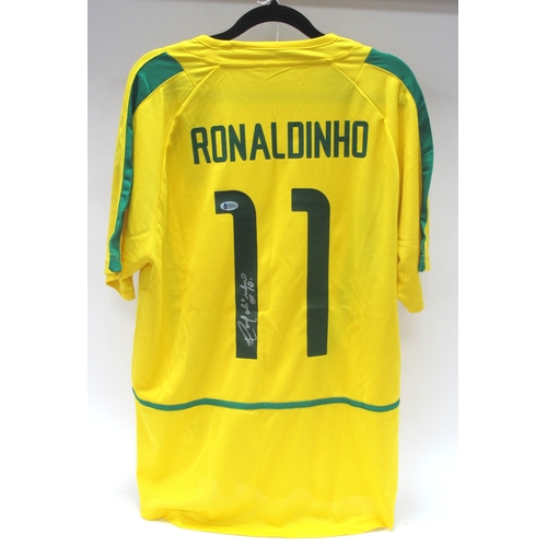 1346 - Football. Ronaldinho Autograph, Silver Pen Signed (Unverified) on the Reverse of a Yellow Brazil Shi... 