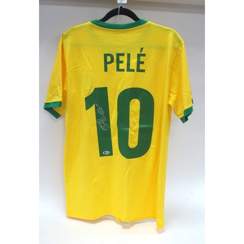 1362 - Football. Pele Autograph, Silver Pen Signed (Unverified) on the Reverse of a Yellow Brazil Shirt, wi... 