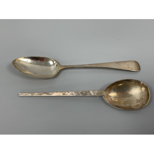 12 - A Georgian Hallmarked Silver Table Spoon, I.L, London 1801, of plain design with initialled handle (... 