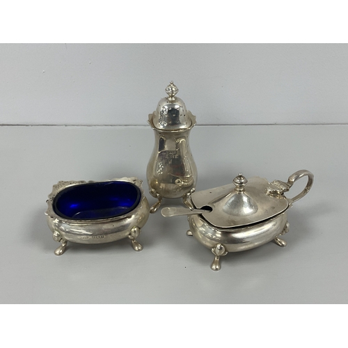 15 - A Hallmarked Silver Three Piece Cruet Set, Walker & Hall, Birmingham 1954, each of plain form with w... 