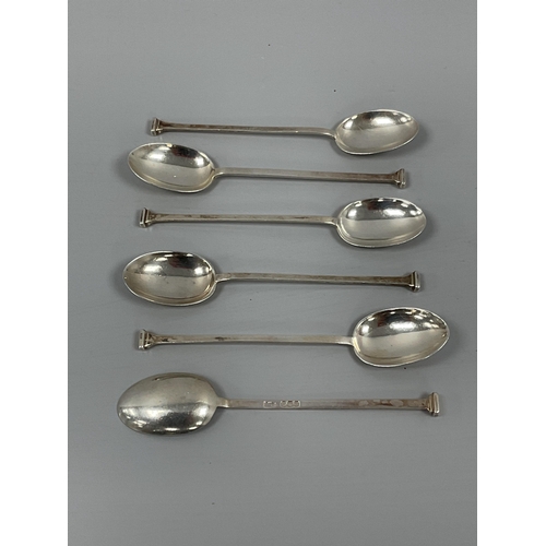 16 - A Set of Four Art Deco Hallmarked Silver Coffee Spoons, CB&S, Sheffield 1923, the slim tapered handl... 