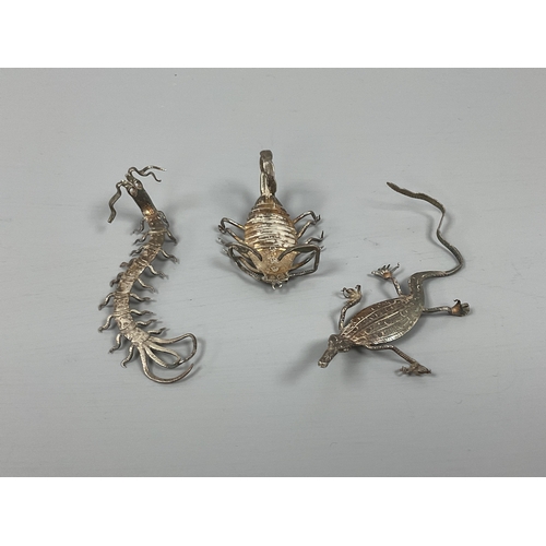 23 - Three Novelty Far Eastern Insect Models, each of textured finish. (3)