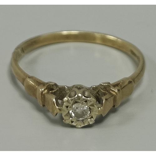 27 - A 9ct Gold Single Stone Diamond Ring, the briliant cut diamond collet set within starburst setting, ... 