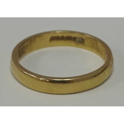 30 - A 22ct Gold Plain Wedding Band, (finger size Q1/2) (4.3grams).