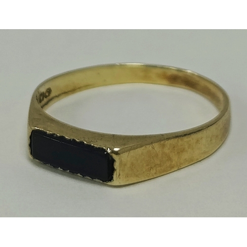 54 - A Modern 9ct Gold Signet Style Ring, a rectangular hardstone inset panel, between plain tapered shou... 