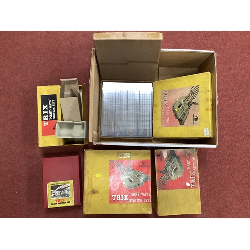 370 - A Quantity of Trix Twin Many Ways Station Sets, boxed, playworn, unchecked and a Trix Whistle set, b... 